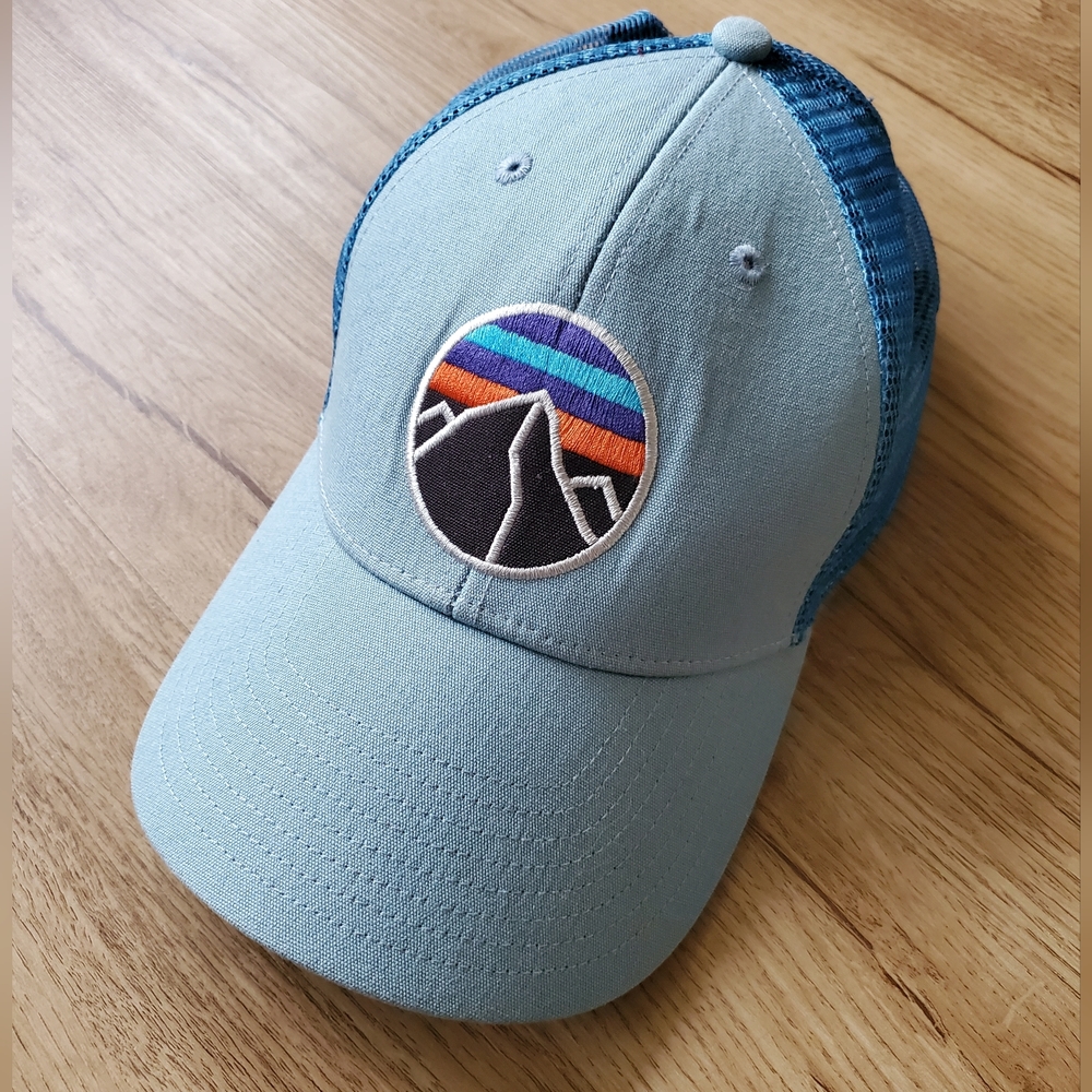 Patagonia Rare Light Blue Trucker Hat with Multicolor Mountain Patch